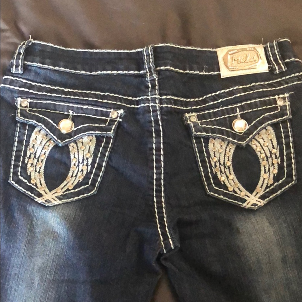 Angel wing jeans